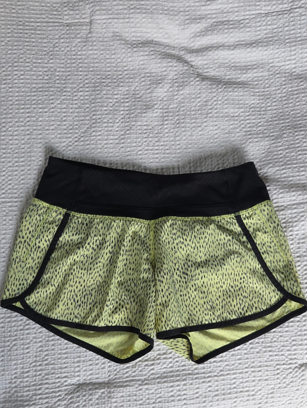 Lululemon Women's sz 4 Neon Yellow Athletic Running Shorts with Black Waistband
